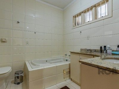 Casa à venda com 231m², 3 quartos, 2 suítes, 2 vagas no bairro Jardim Itu em Porto Alegre - Foto 13