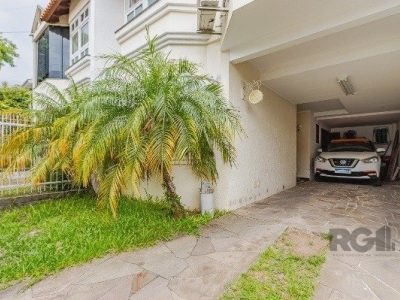 Casa à venda com 231m², 3 quartos, 2 suítes, 2 vagas no bairro Jardim Itu em Porto Alegre - Foto 24