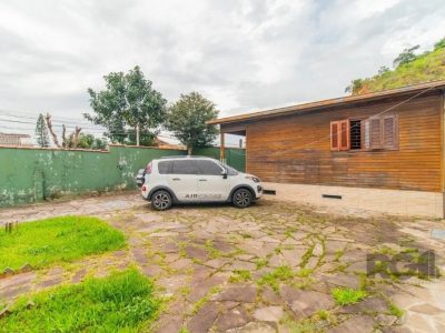 Casa à venda com 114m², 3 quartos, 5 vagas no bairro Partenon em Porto Alegre - Foto 5