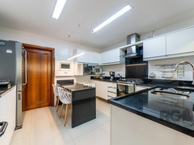 Apartamento à venda com 165m², 3 quartos, 1 suíte, 2 vagas no bairro Auxiliadora em Porto Alegre - Foto 9