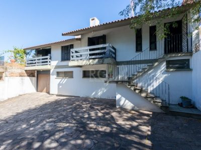 Casa à venda com 286m², 2 quartos, 1 suíte, 3 vagas no bairro Santa Tereza em Porto Alegre - Foto 2