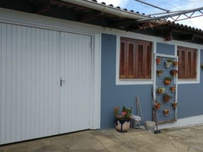 Casa à venda com 171m², 3 quartos, 1 suíte, 2 vagas no bairro Santa Tereza em Porto Alegre - Foto 12