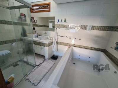 Casa à venda com 160m², 4 quartos, 2 suítes, 4 vagas no bairro Ipanema em Porto Alegre - Foto 22