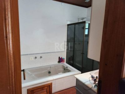 Casa à venda com 150m², 3 quartos, 2 suítes, 3 vagas no bairro Azenha em Porto Alegre - Foto 11