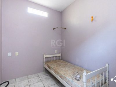 Casa à venda com 180m², 3 quartos, 3 vagas no bairro Partenon em Porto Alegre - Foto 62