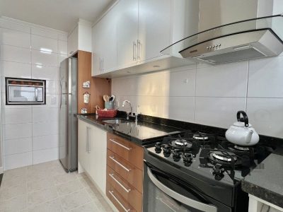 Apartamento à venda com 65m², 2 quartos, 1 suíte, 2 vagas no bairro Menino Deus em Porto Alegre - Foto 9