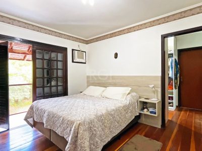 Casa à venda com 306m², 4 quartos, 4 suítes, 6 vagas no bairro Jardim Itu em Porto Alegre - Foto 21