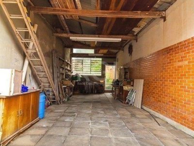 Casa à venda com 350m², 3 quartos, 2 suítes, 5 vagas no bairro Santo Antônio em Porto Alegre - Foto 32