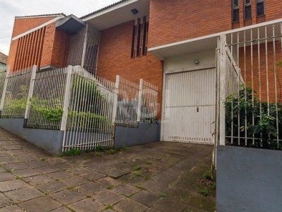 Casa à venda com 350m², 3 quartos, 2 suítes, 5 vagas no bairro Santo Antônio em Porto Alegre - Foto 33