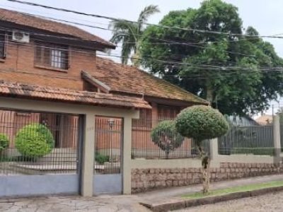 Casa à venda com 228m², 3 quartos, 1 suíte, 4 vagas no bairro Ipanema em Porto Alegre - Foto 2