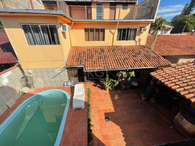 Casa à venda com 400m², 5 quartos, 3 suítes, 4 vagas no bairro Ipanema em Porto Alegre - Foto 46