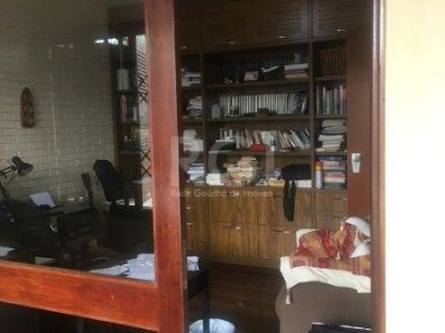 Casa à venda com 406m², 3 quartos, 1 suíte, 4 vagas no bairro Três Figueiras em Porto Alegre - Foto 17