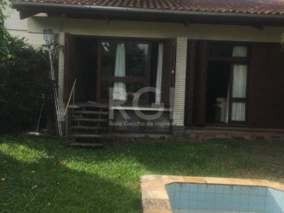 Casa à venda com 406m², 3 quartos, 1 suíte, 4 vagas no bairro Três Figueiras em Porto Alegre - Foto 25