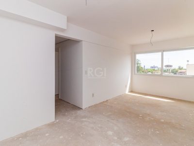 Apartamento à venda com 65m², 3 quartos, 1 suíte, 2 vagas no bairro Higienópolis em Porto Alegre - Foto 4