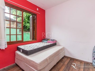 Casa à venda com 120m², 4 quartos, 1 vaga no bairro Medianeira em Porto Alegre - Foto 18