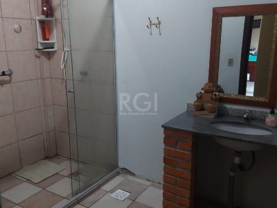 Casa à venda com 244m², 5 quartos, 3 suítes, 6 vagas no bairro Cristal em Porto Alegre - Foto 8