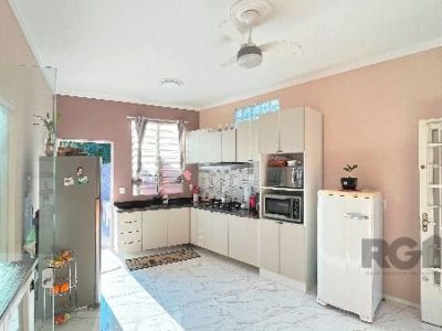 Casa à venda com 100m², 3 quartos, 1 vaga no bairro Medianeira em Porto Alegre - Foto 11