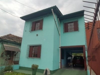 Casa à venda com 144m², 4 quartos, 3 vagas no bairro Partenon em Porto Alegre - Foto 12