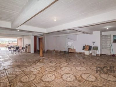 Casa à venda com 414m², 4 quartos, 1 suíte, 4 vagas no bairro Santo Antônio em Porto Alegre - Foto 31