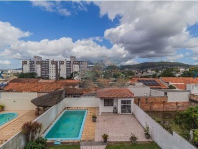 Casa à venda com 414m², 4 quartos, 1 suíte, 4 vagas no bairro Santo Antônio em Porto Alegre - Foto 12