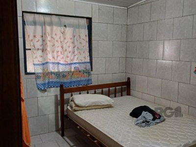 Casa à venda com 65m², 3 quartos, 1 suíte, 5 vagas no bairro Glória em Porto Alegre - Foto 8