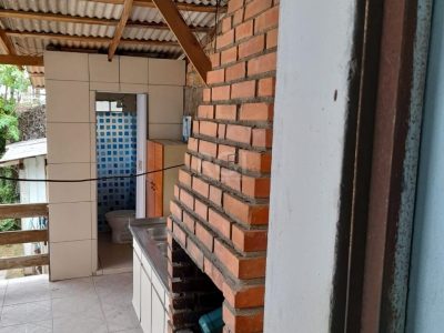 Casa à venda com 215m², 4 quartos, 1 vaga no bairro Partenon em Porto Alegre - Foto 14