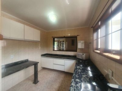 Casa à venda com 347m², 5 quartos, 3 suítes, 1 vaga no bairro Jardim Itu em Porto Alegre - Foto 16