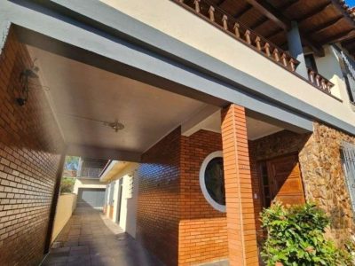 Casa à venda com 347m², 5 quartos, 3 suítes, 1 vaga no bairro Jardim Itu em Porto Alegre - Foto 2