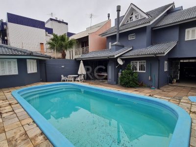 Casa à venda com 378m², 3 quartos, 1 suíte, 4 vagas no bairro Jardim Itu em Porto Alegre - Foto 9