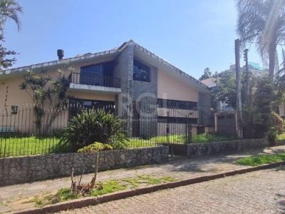 Casa à venda com 400m², 4 quartos, 1 suíte, 4 vagas no bairro Jardim Lindóia em Porto Alegre - Foto 3