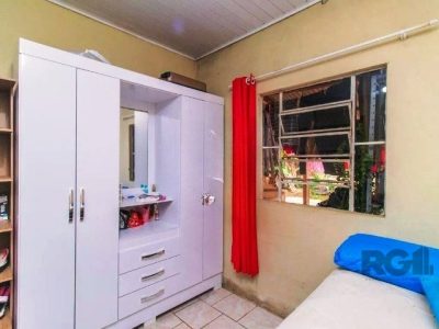 Casa à venda com 70m², 2 quartos, 3 vagas no bairro Santa Tereza em Porto Alegre - Foto 9