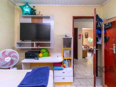 Casa à venda com 70m², 2 quartos, 3 vagas no bairro Santa Tereza em Porto Alegre - Foto 11