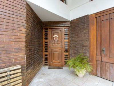 Casa à venda com 250m², 5 quartos, 2 suítes, 6 vagas no bairro Tristeza em Porto Alegre - Foto 4