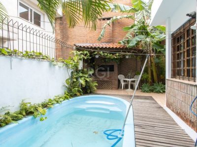 Casa à venda com 250m², 5 quartos, 2 suítes, 6 vagas no bairro Tristeza em Porto Alegre - Foto 35