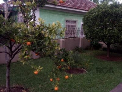 Casa à venda com 320m², 4 quartos, 2 suítes, 5 vagas no bairro Santo Antônio em Porto Alegre - Foto 12