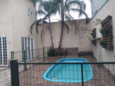 Casa à venda com 200m², 3 quartos, 2 suítes, 4 vagas no bairro Jardim Itu em Porto Alegre - Foto 2