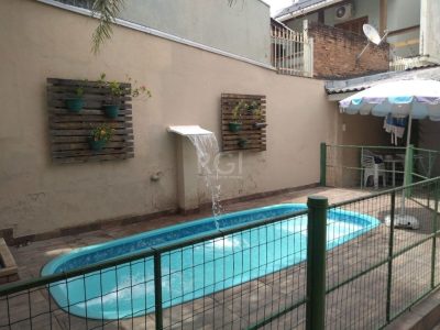 Casa à venda com 200m², 3 quartos, 2 suítes, 4 vagas no bairro Jardim Itu em Porto Alegre - Foto 6