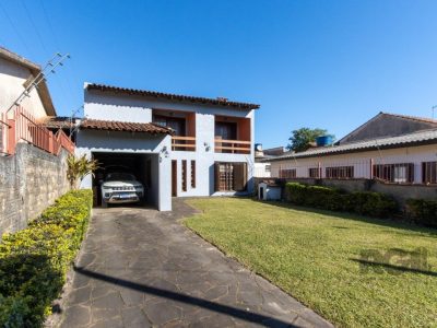 Casa à venda com 223m², 3 quartos, 1 suíte, 4 vagas no bairro Tristeza em Porto Alegre - Foto 2