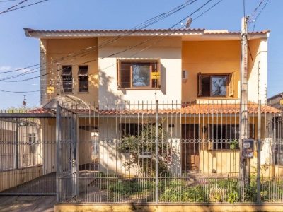 Casa à venda com 319m², 3 quartos, 1 suíte, 2 vagas no bairro Vila Ipiranga em Porto Alegre - Foto 14