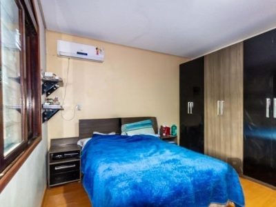 Casa à venda com 303m², 4 quartos, 1 suíte, 2 vagas no bairro Santo Antônio em Porto Alegre - Foto 13