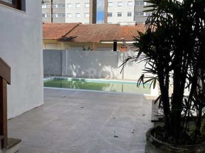 Casa Condominio à venda com 150m², 3 quartos, 1 suíte, 2 vagas no bairro Santo Antônio em Porto Alegre - Foto 10