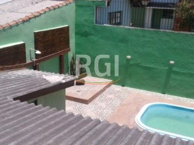 Casa à venda com 450m², 4 quartos, 1 suíte, 2 vagas no bairro Vila Ipiranga em Porto Alegre - Foto 15