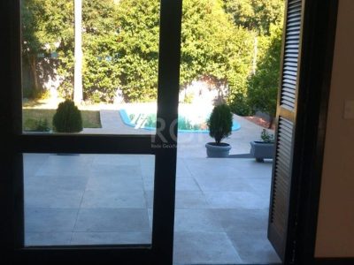 Casa à venda com 204m², 4 quartos, 1 suíte, 2 vagas no bairro Cristal em Porto Alegre - Foto 12