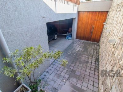 Casa à venda com 351m², 4 quartos, 3 suítes, 3 vagas no bairro Santo Antônio em Porto Alegre - Foto 53