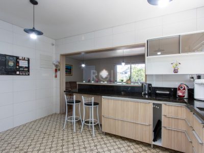 Casa à venda com 148m², 3 quartos, 3 vagas no bairro Medianeira em Porto Alegre - Foto 11