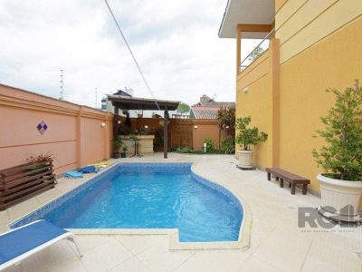 Casa à venda com 330m², 3 quartos, 2 suítes, 3 vagas no bairro Jardim Lindóia em Porto Alegre - Foto 9