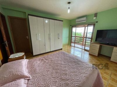 Casa à venda com 130m², 4 quartos, 1 suíte, 2 vagas no bairro Ipanema em Porto Alegre - Foto 12