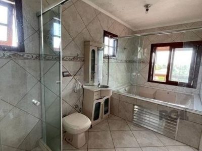 Casa à venda com 130m², 4 quartos, 1 suíte, 2 vagas no bairro Ipanema em Porto Alegre - Foto 16