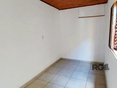 Casa à venda com 112m², 3 quartos, 2 vagas no bairro Cristal em Porto Alegre - Foto 11