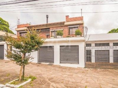 Casa à venda com 440m², 3 quartos, 1 suíte, 2 vagas no bairro Santa Tereza em Porto Alegre - Foto 2